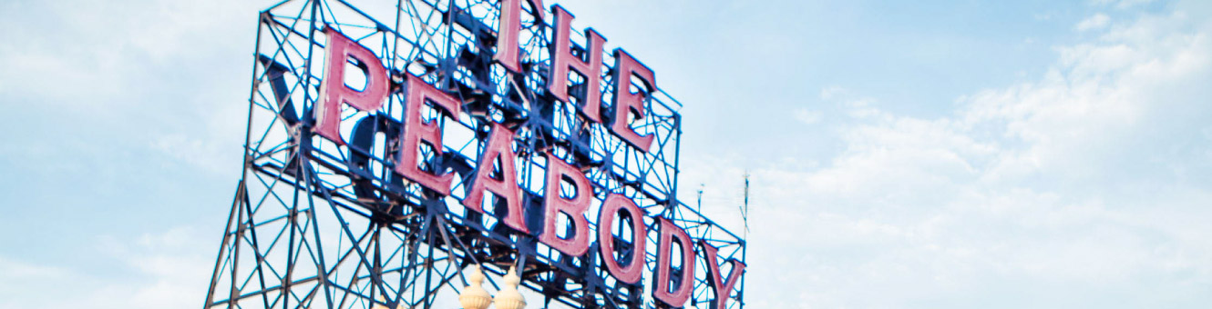 Large metal sign that says "The Peabody"